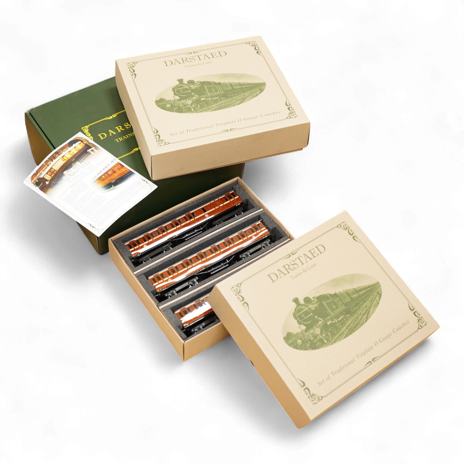 A boxed 0 gauge Darstaed tinplate Metropolitan Railway set of bogie coaches, a rake of five coaches in teak livery including; two Brake Thirds, two Full Thirds, and a Full First, fitted with internal lighting throughout